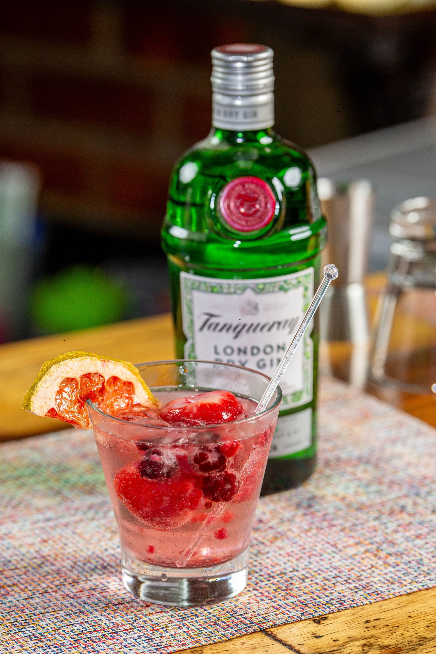 Sparkling spritz with fresh berries and orange