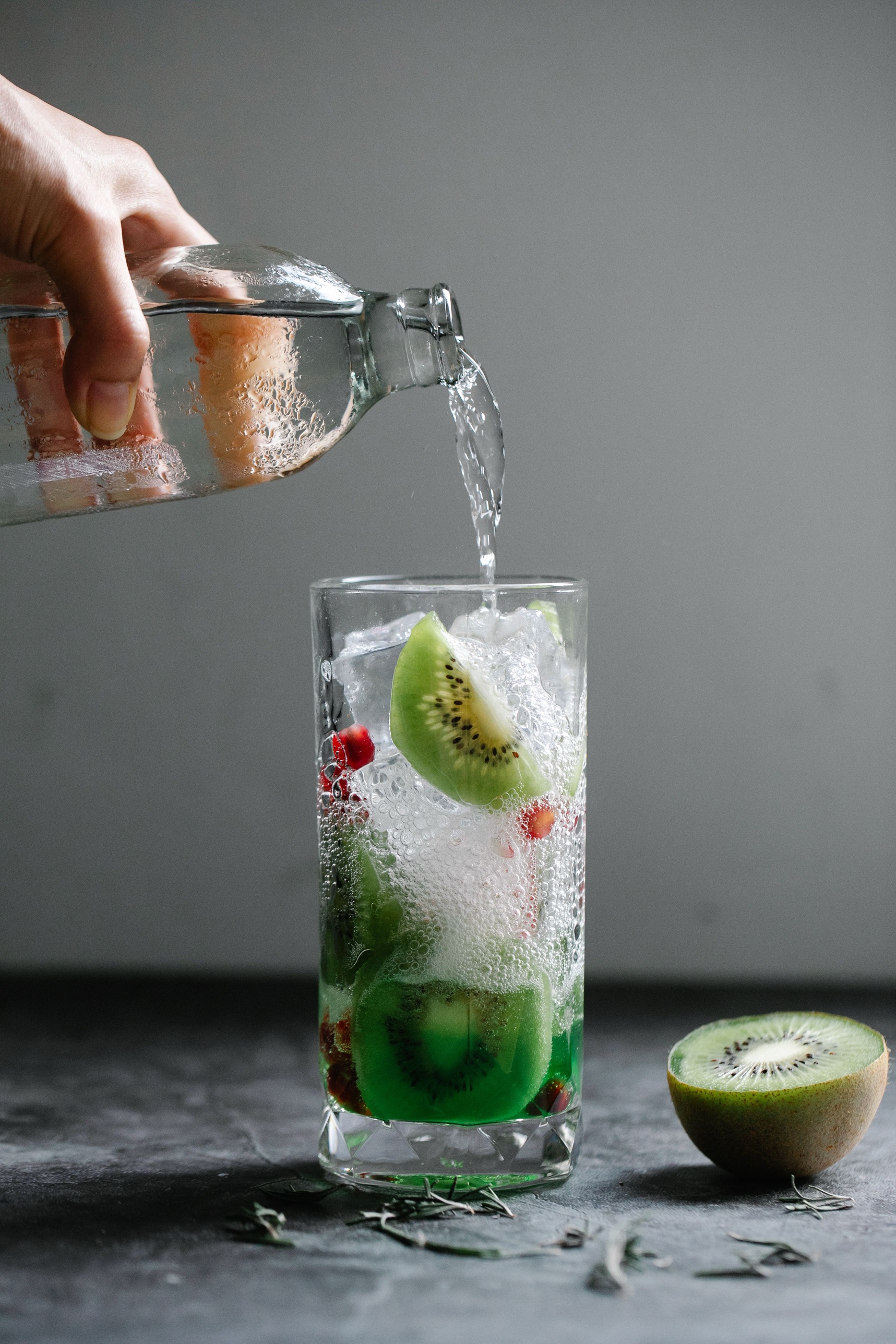 A flight of colorful craft cocktails on the bar